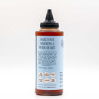 Side view of the bottle featuring the "Make Your Morning a Work of Art" quote and dietary badges.